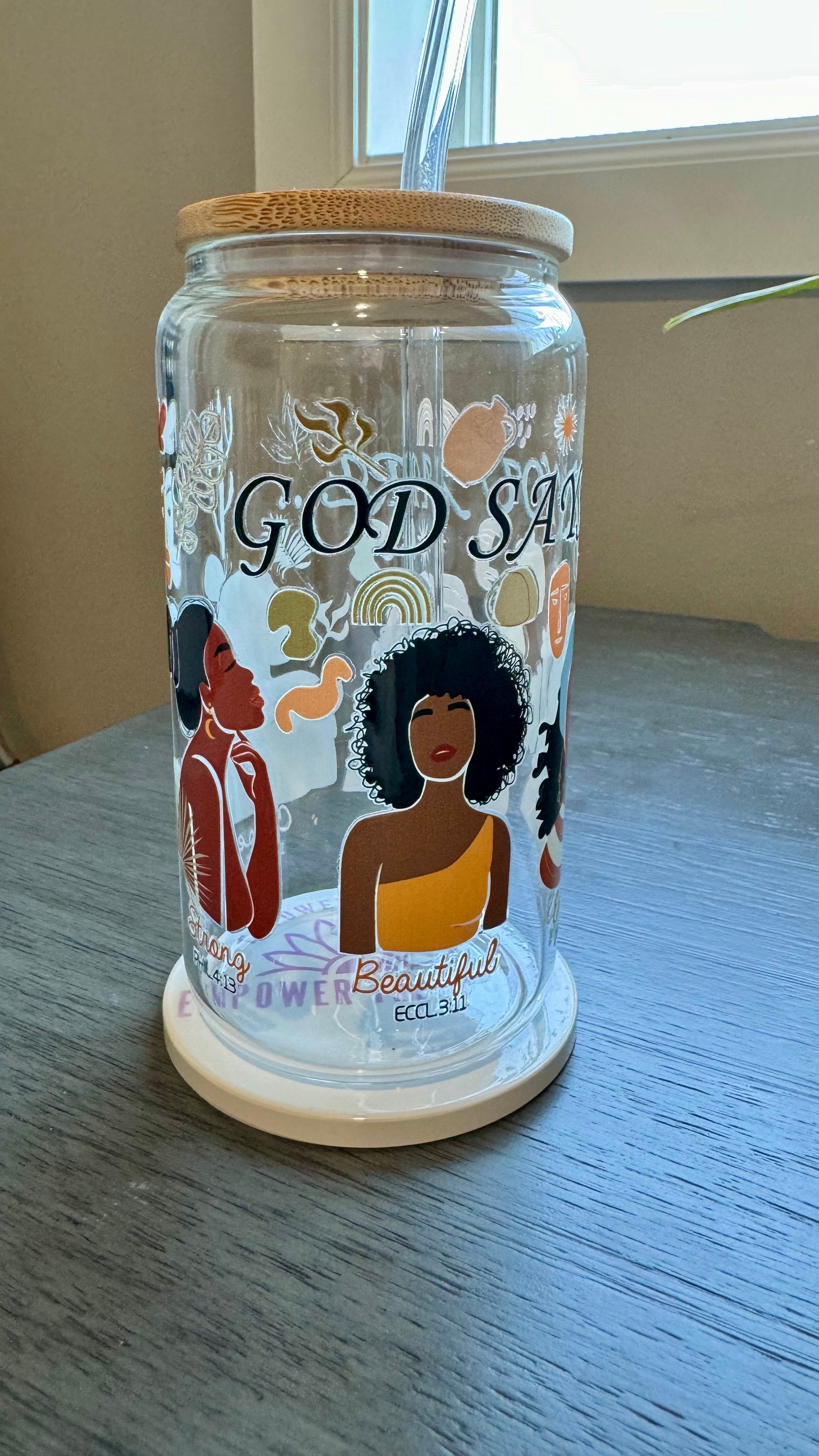 Experience the power of positive affirmations with our God Says You Are... Glass Tumbler. This 16 ounce tumbler features uplifting words of beauty, strength, and more, reminding you of your true potential. Made with UV DTF transfer for long-lasting use. Refresh your soul with every sip.