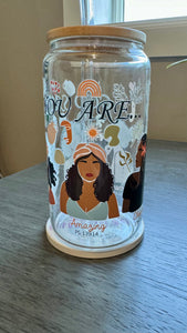 Experience the power of positive affirmations with our God Says You Are... Glass Tumbler. This 16 ounce tumbler features uplifting words of beauty, strength, and more, reminding you of your true potential. Made with UV DTF transfer for long-lasting use. Refresh your soul with every sip.