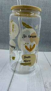 Introducing The Best Is Yet To Come Glass Tumbler. Crafted with a UV DTF transfer, this 16 oz tumbler features a motivational quote to inspire you daily. Enjoy your favorite beverage while reminding yourself that the best is yet to come. Stay positive and motivated with this stylish glass tumbler.