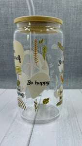 Introducing The Best Is Yet To Come Glass Tumbler. Crafted with a UV DTF transfer, this 16 oz tumbler features a motivational quote to inspire you daily. Enjoy your favorite beverage while reminding yourself that the best is yet to come. Stay positive and motivated with this stylish glass tumbler.