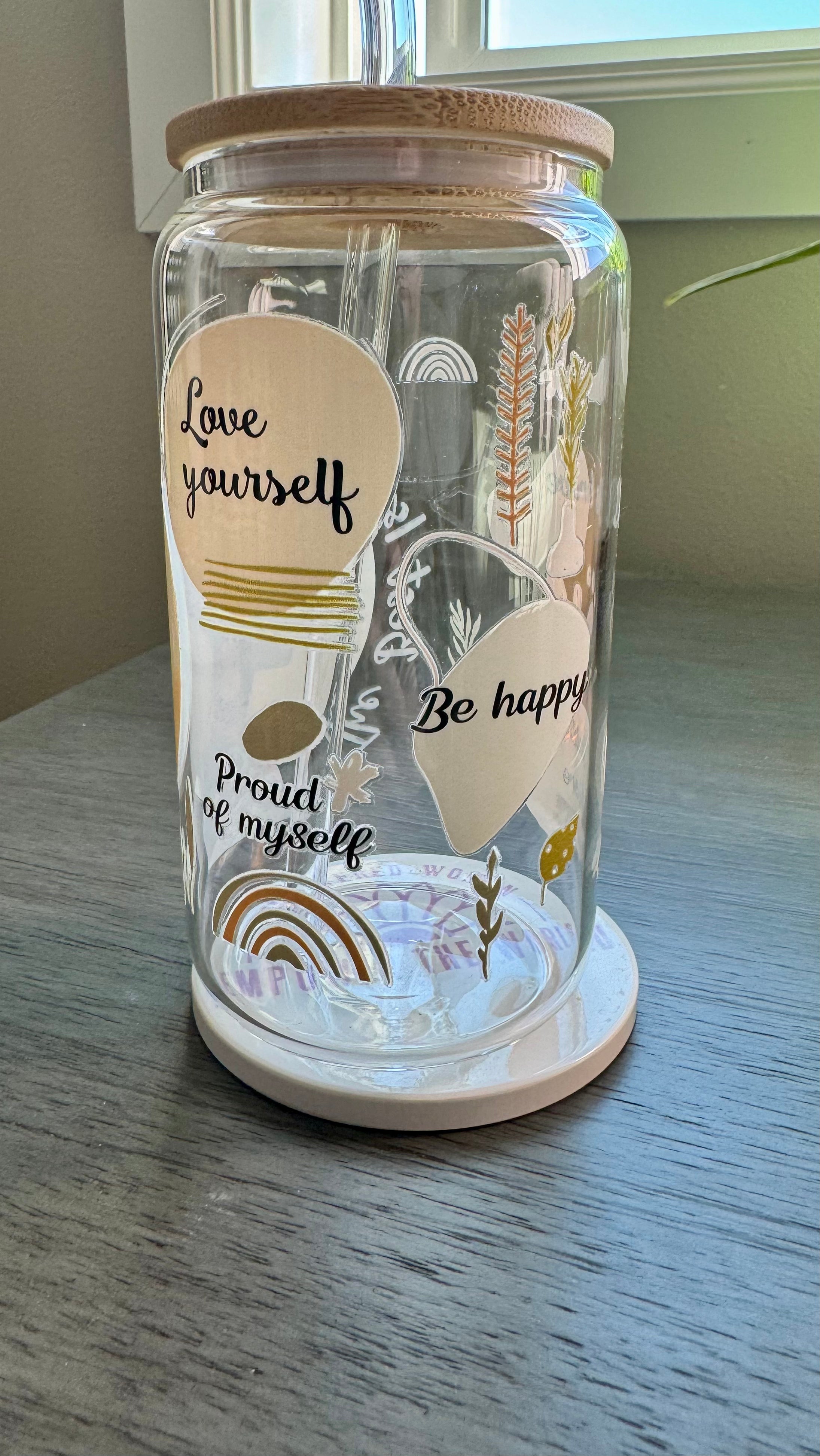 Introducing The Best Is Yet To Come Glass Tumbler. Crafted with a UV DTF transfer, this 16 oz tumbler features a motivational quote to inspire you daily. Enjoy your favorite beverage while reminding yourself that the best is yet to come. Stay positive and motivated with this stylish glass tumbler.