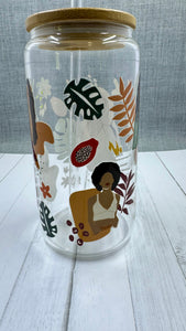 This Black Girl Glass Tumbler along with a glass straw holds 16 ounces and is wrapped in durable UV DTF material, ensuring long-lasting use for all your beverages. Showcasing a black girl design, this tumbler is both stylish and functional, making it the perfect choice for any drink on-the-go.