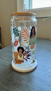 This Black Girl Glass Tumbler along with a glass straw holds 16 ounces and is wrapped in durable UV DTF material, ensuring long-lasting use for all your beverages. Showcasing a black girl design, this tumbler is both stylish and functional, making it the perfect choice for any drink on-the-go.