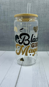 Introducing the Black Girl Magic Glass Tumbler. This 16 ounce tumbler features a beautiful "Black Girl Magic" design, created through UV DTF transfer technology. Show off your pride and hydration with this high-quality glass tumbler.