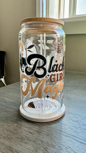 Introducing the Black Girl Magic Glass Tumbler. This 16 ounce tumbler features a beautiful "Black Girl Magic" design, created through UV DTF transfer technology. Show off your pride and hydration with this high-quality glass tumbler.