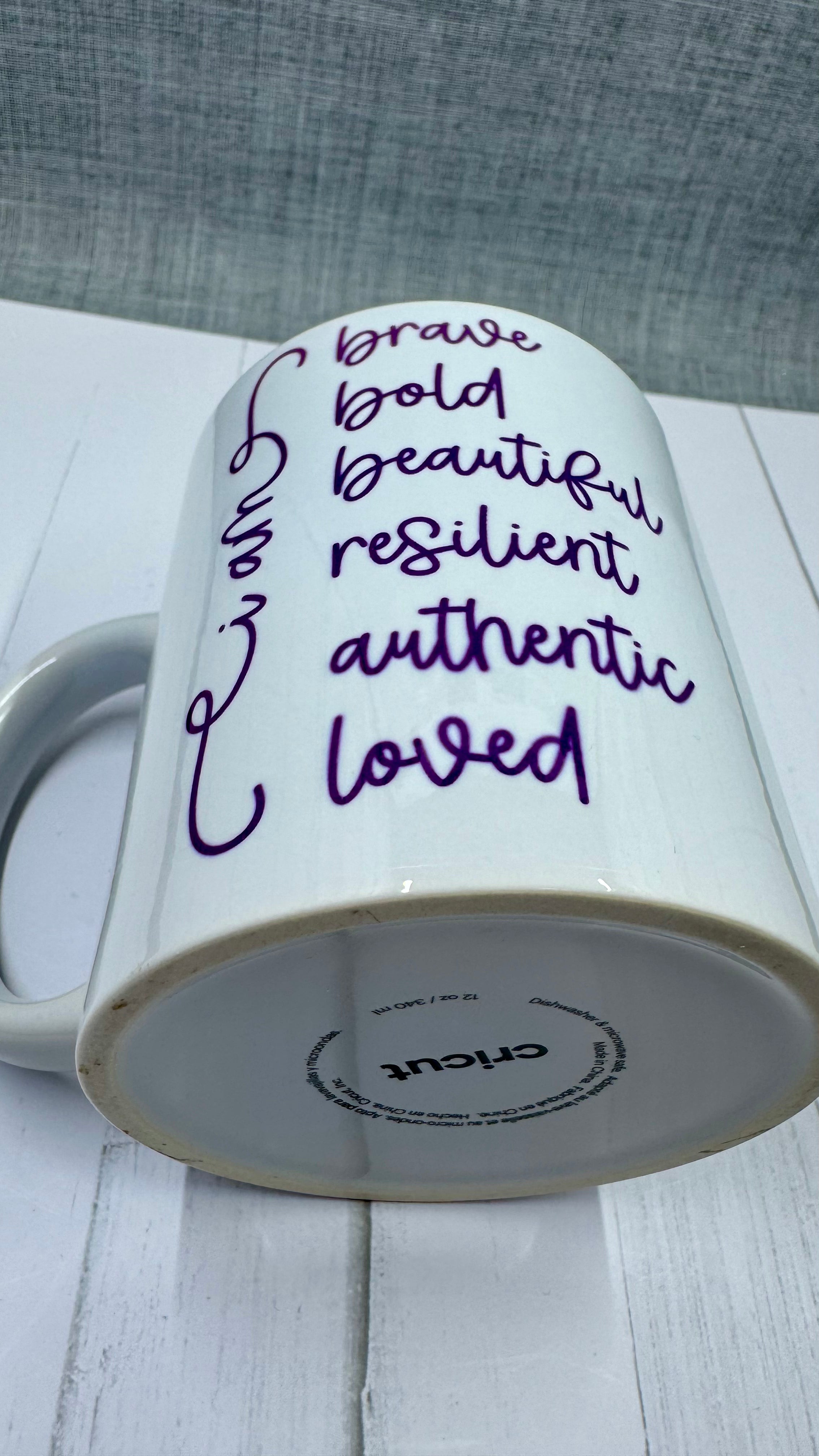 Our Affirmation Mug is a beautiful and durable ceramic mug that features an affirmation reminder that you are brave, bold, beautiful, resilient, authentic, and loved. The infusible ink used in the design process ensures long-lasting and vibrant colors, making this mug a perfect addition to any collection. Create a unique and stylish statement with this expertly crafted mug.