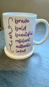 Our Affirmation Mug is a beautiful and durable ceramic mug that features an affirmation reminder that you are brave, bold, beautiful, resilient, authentic, and loved. The infusible ink used in the design process ensures long-lasting and vibrant colors, making this mug a perfect addition to any collection. Create a unique and stylish statement with this expertly crafted mug.