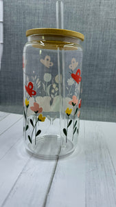 The MAMA Glass Tumbler features a beautiful UV DTF transfer design of flowers and butterflies. With a 16 ounce capacity, it is perfect for your favorite cold beverages. Stay hydrated and in style with this elegant and durable tumbler.