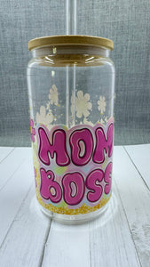 Celebrate Mother's Day with our Mom Boss Glass Tumbler Set. This 16oz tumbler features a unique UV DTF transfer, perfect for moms who appreciate quality and style. The set also includes a beautifully designed Mother's Day card with a wax seal for an extra personal touch. Show your love and appreciation with this thoughtful gift set.