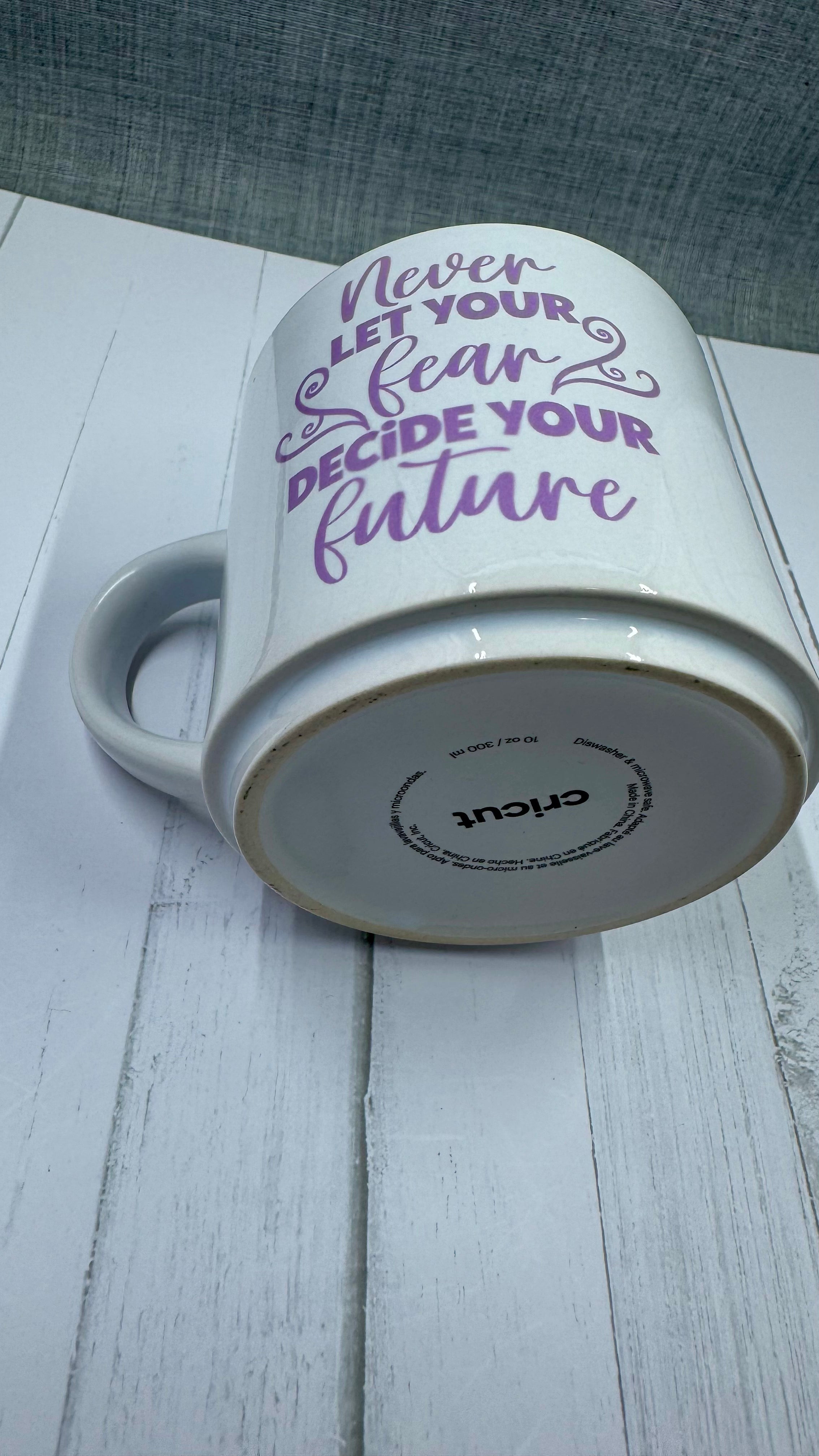 This mug is a beautiful and durable ceramic mug that features an important reminder to never let your fear decide your future. The infusible ink used in the design process ensures long-lasting and vibrant colors, making this mug a perfect addition to any collection. Create a unique and stylish statement with this expertly crafted mug.