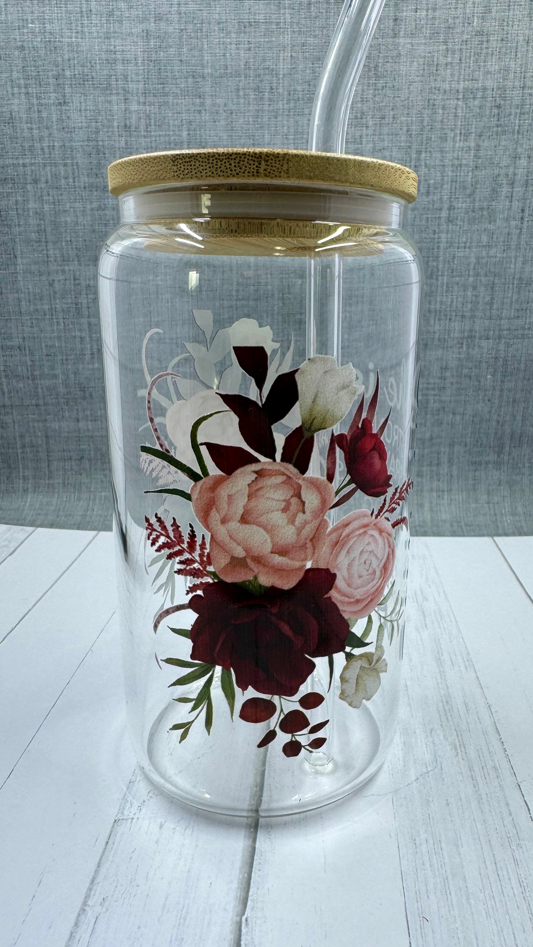 Elevate your gift-giving game with our She is...mom Glass Tumbler. Crafted with a 16 ounce capacity, this tumbler is adorned with beautiful red and pink roses. The UV DTF transfer showcases the phrase "she is strong brave fearless loving patient selfless mom", making it the perfect way to show appreciation for the special mom in your life.