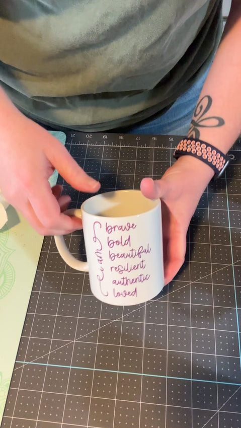 Our Affirmation Mug is a beautiful and durable ceramic mug that features an affirmation reminder that you are brave, bold, beautiful, resilient, authentic, and loved. The infusible ink used in the design process ensures long-lasting and vibrant colors, making this mug a perfect addition to any collection. Create a unique and stylish statement with this expertly crafted mug.