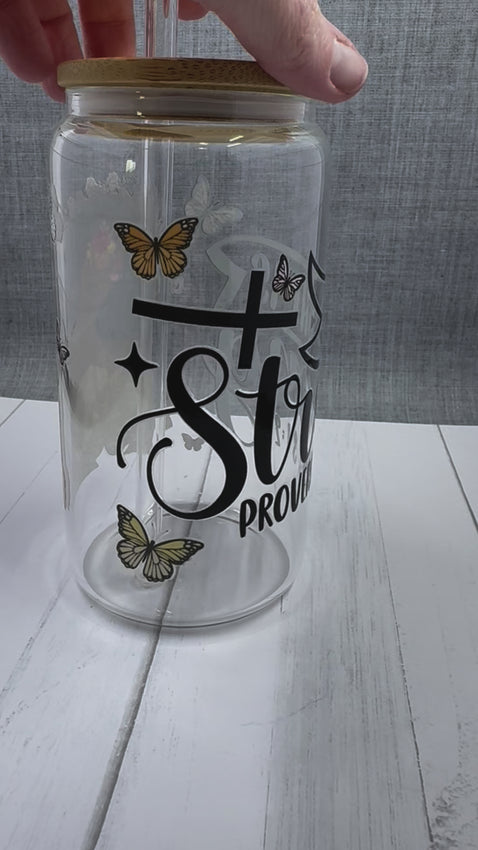 Expertly crafted with 16 ounces of glass, our She is strong Glass Tumbler features a unique UV DTF transfer design. Showcasing the empowering message "she is strong" along with a striking black queen, this tumbler is a stylish and uplifting addition to your drinkware collection.